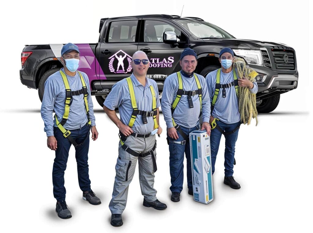 The Atlas Roofing team in front of company truck